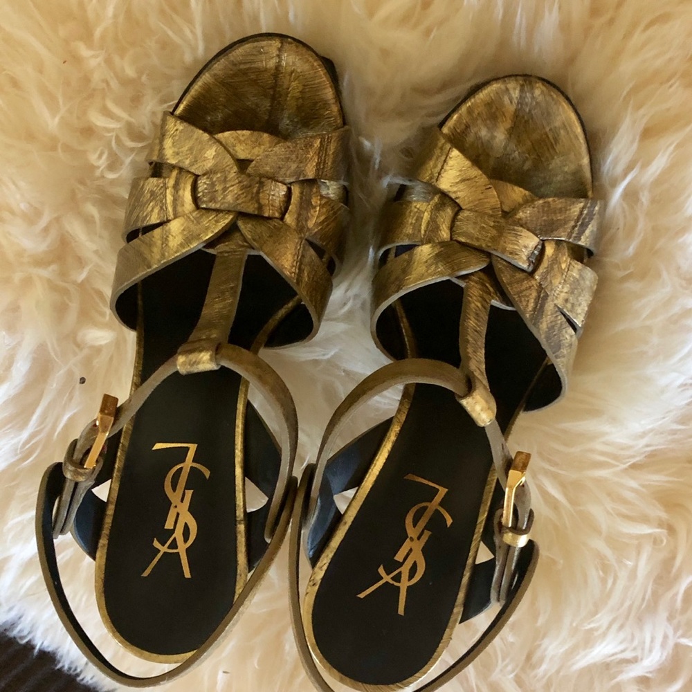 YSL tribute in a mix of gold and black leather.
